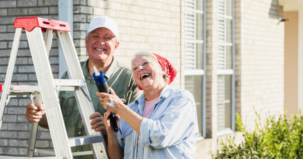An elderly couple refreshing their garden with home improvements