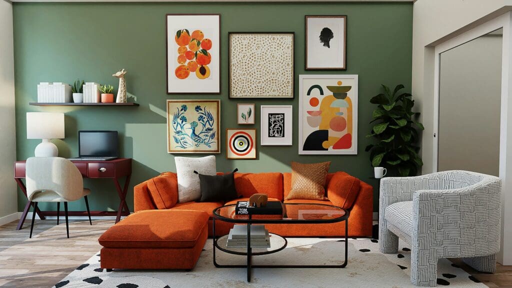 A stylish living room featuring a green accent wall, with paintings hanging on the wall. The space is furnished with an orange and white sofa and includes a computer table in the corner, creating a functional and comfortable work and relaxation area, a lease to own home perfect for self-employed professionals.