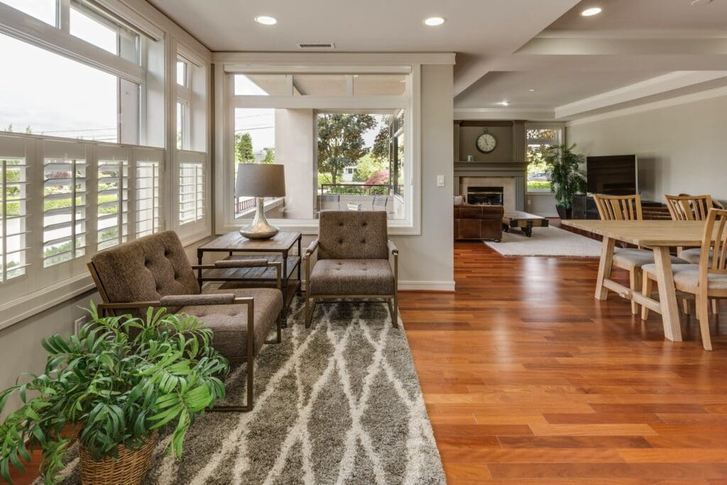 A warm and inviting living room that offers a sense of comfort and stability—ideal for families who feel they cannot afford to move but are seeking better options.