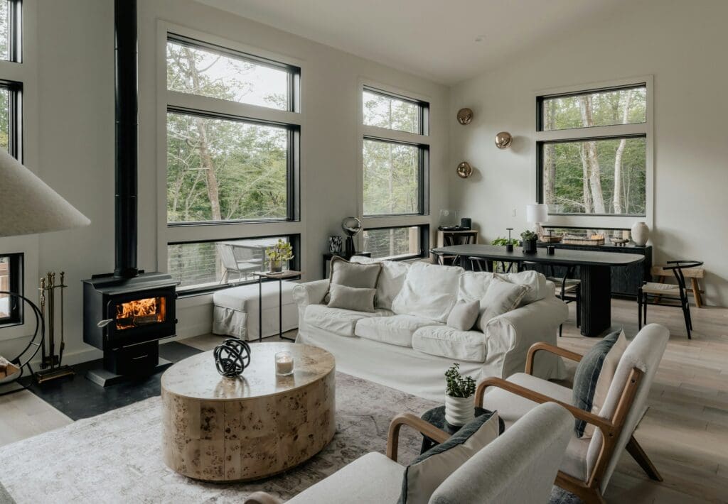 Modern living room with soft lighting, plush seating, and a cozy ambiance—an inviting option for those exploring homes for rent in Raleigh NC with long-term potential.