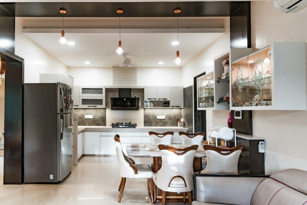 A thoughtfully styled kitchen and dining area with calming decor, offering inspiration for anyone searching for rent to own Raleigh solutions that feel like home from day one.