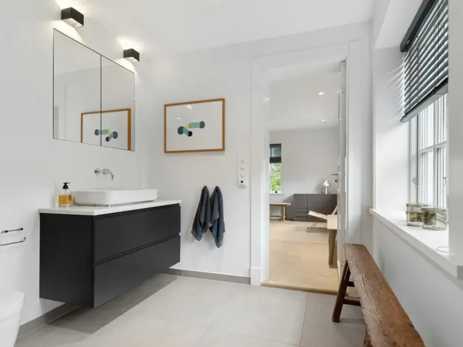 Bright and modern bathroom offering both style and peace of mind, ideal for those exploring lease to own Raleigh as a smarter alternative in uncertain housing conditions.