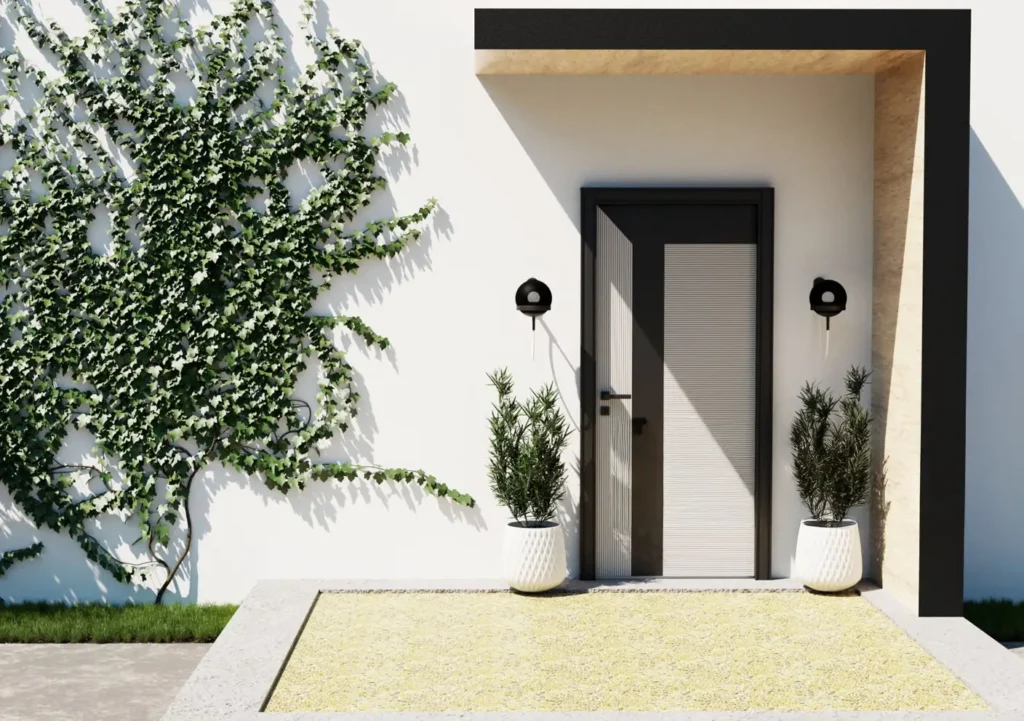 Large patio in modern home entrance with white walls and ivy growing on the side.